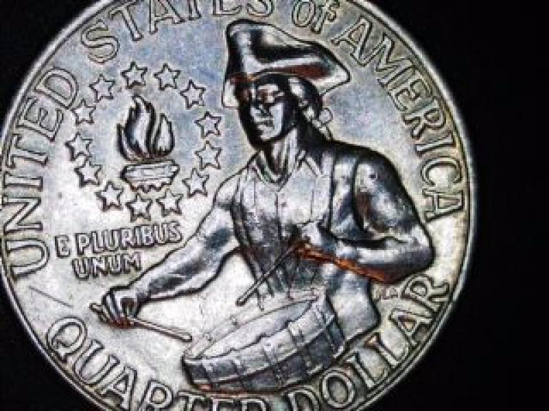 This Bicentennial Washington Quarter has what looks like…