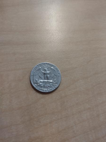 1966 coin everything readable. the LIBERTY text feels…