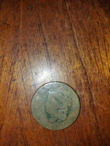 This coin is a 1816 United States penny,…