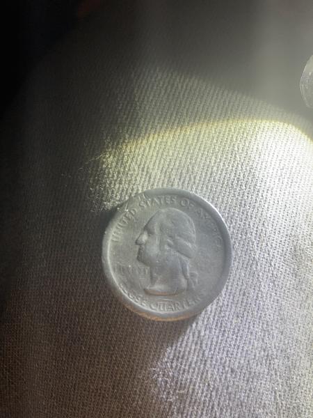 The obverse of the coin looks like it was pounded&hellip;