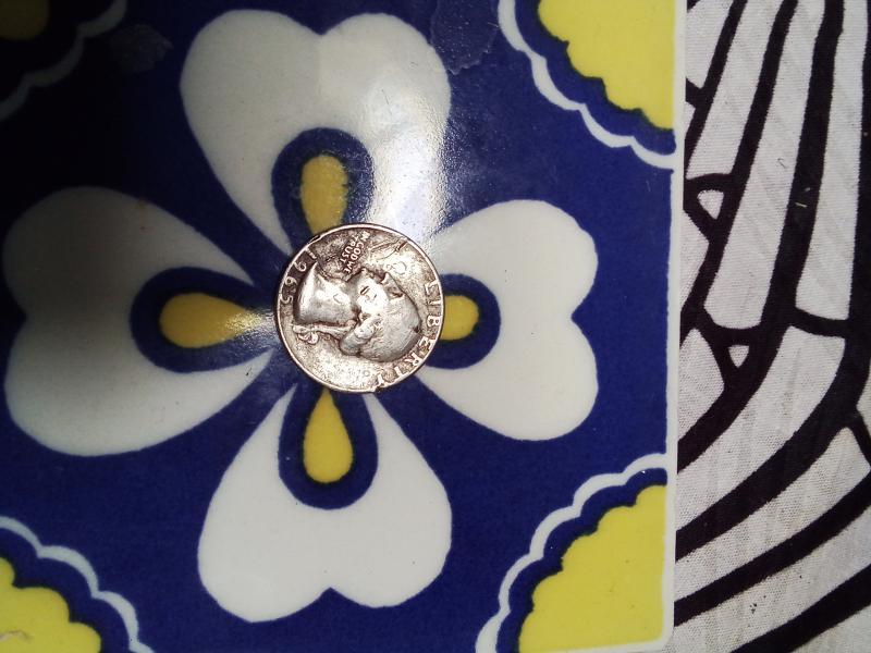 1965 no mint quarter with print errors