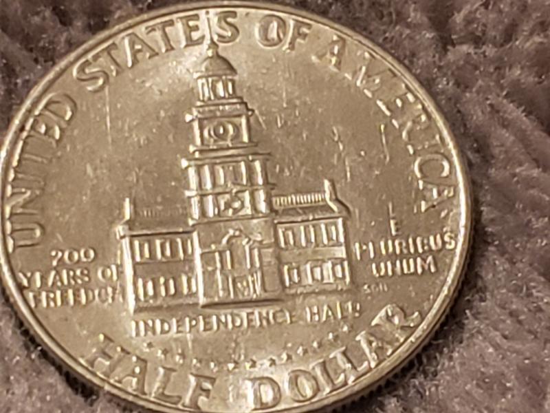1776 19776 bicentennial half dollar in the word…