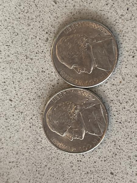 2004 nickel with handshake on the back