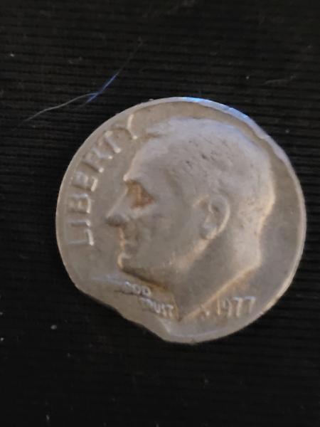 1977 dime with damage and errors