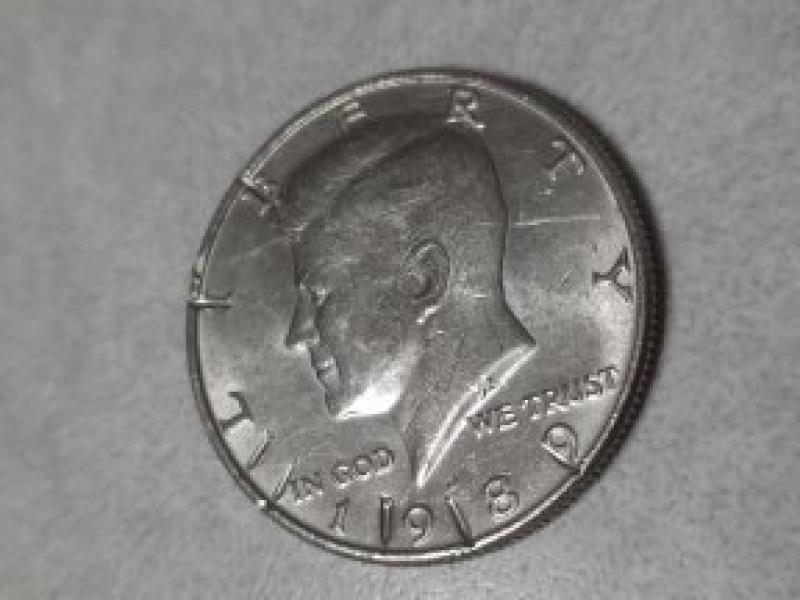 The marks on the obverse appear to be…