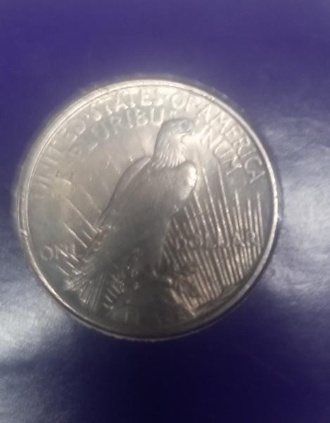 1923 Peace Dollar and Kennedy half dollar