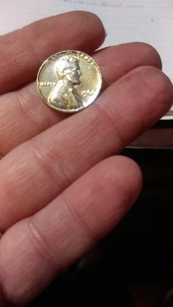 1966 no mint mark penny. Sticks to magnet.