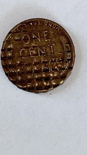 Hi! I found this cool looking wheat penny.…
