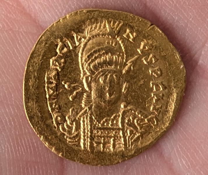 Looks like a Byzantine/ Leo I coin. I'm…