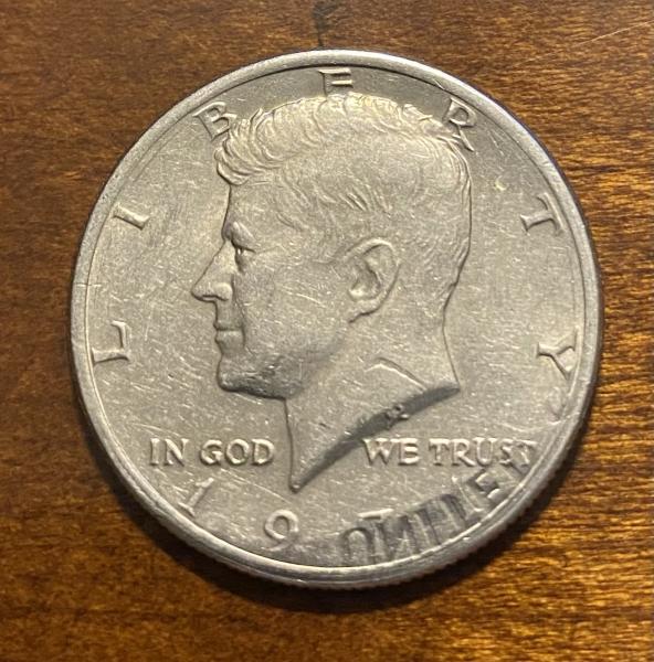 1971 Half with UNITED and partial S stamped…