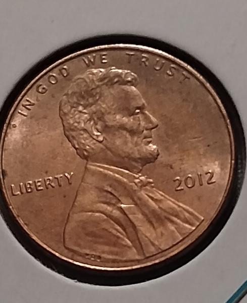 2012 penny with shadows on the reverse double strike