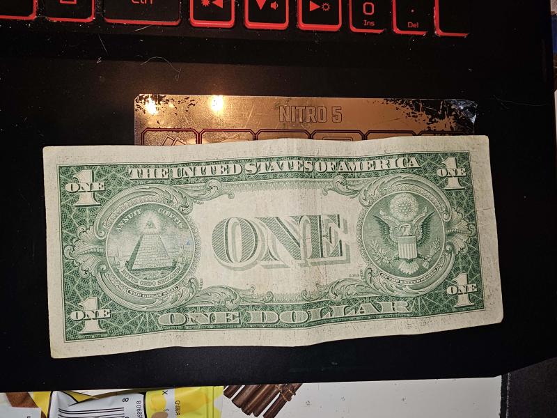 1915D silver certificate. Seems to be misprinted or misaligned