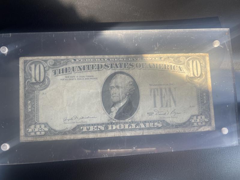 1981 10 dollar bill with stamp and serial&hellip;