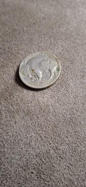 Buffalo nickel with D stamp, no date is visible