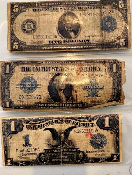 dollar notes and coins
