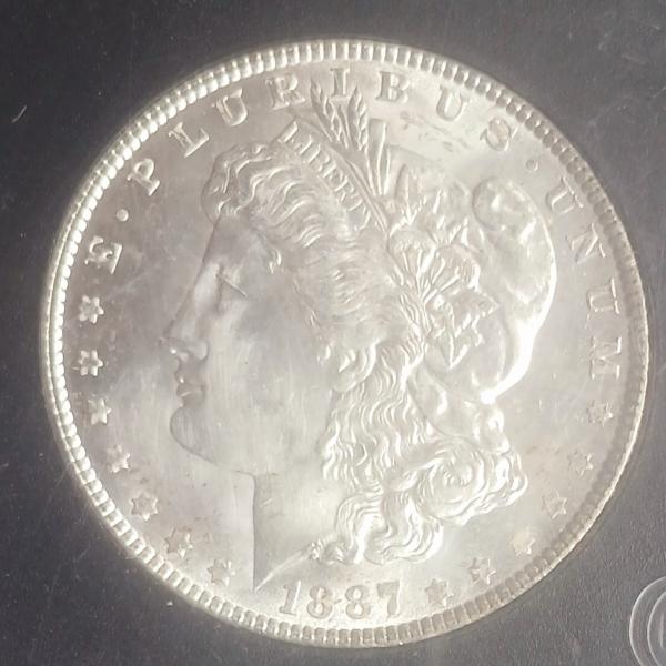 I believe this is an uncirculated 1887 morgan…
