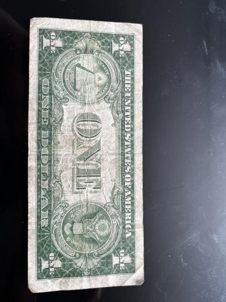 1935 F series dollar bill with blue seal