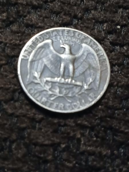 1965 quarter and A 1974 half dollar