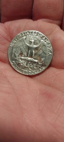 copper showing through face. factory mistake. 1974