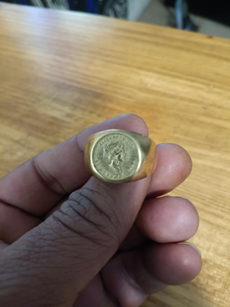 18k gold men ring how much is it worth