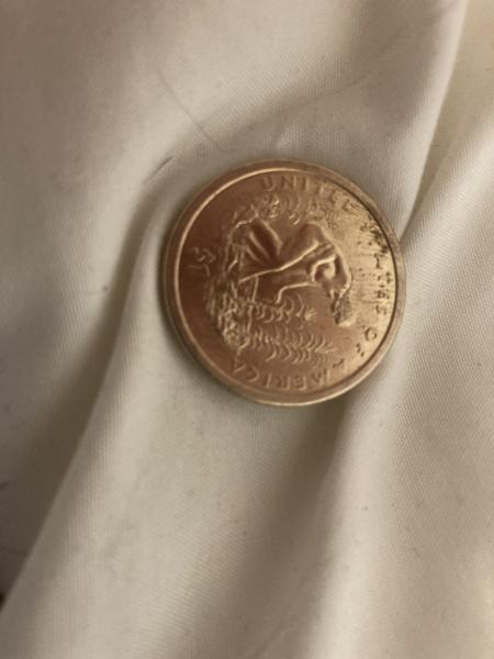 2009 Sacagawea Dollar Coin with a different back.…