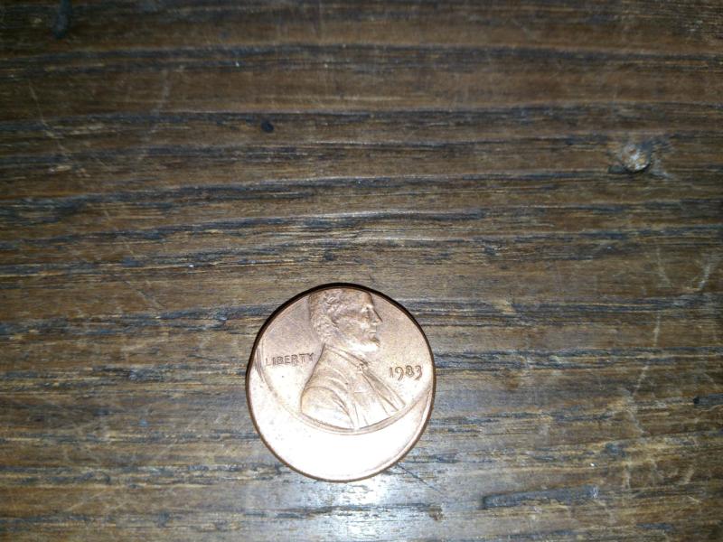 1983 off center strike found in an unopened roll.