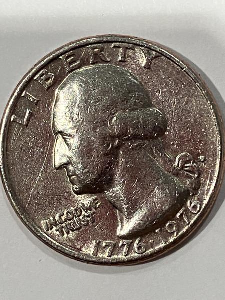 1776-1976 quarter with filled D mark error.