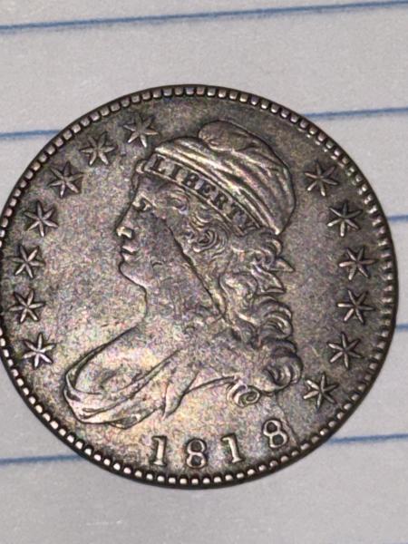 1818 with a potential die crack across the…