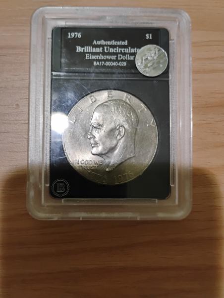 Authenticated brilliant uncirculated Eisenhower dollar