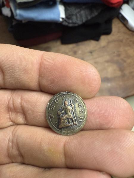 I believe it’s an old Roman coin. I…