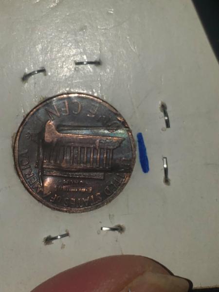 1974 lincoln cent strike through by a foreign object
